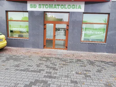 Stomatolog Smart Dent leczenie kanałowe pod mikroskopem dentysta chirurgia stomatologiczna